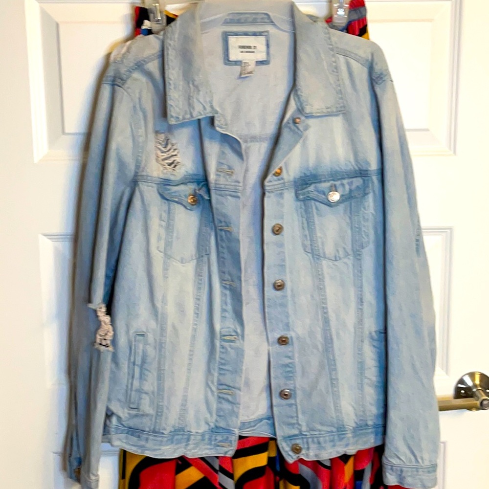 Distressed light wash jean jacket
